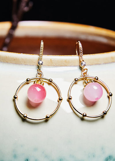 美麗的粉紅水晶圓形鍍金垂墜耳環